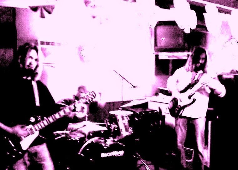 V rehearsing on electric guitar with his band